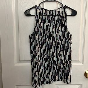 Rectangle/geometric patterned blouse in purple, black, white, and light blue